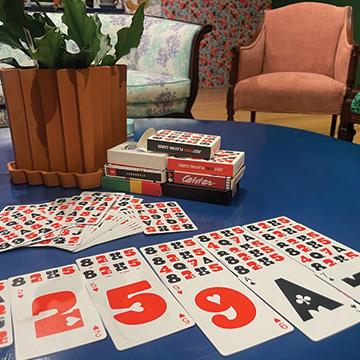 playing cards laid out on a coffee table