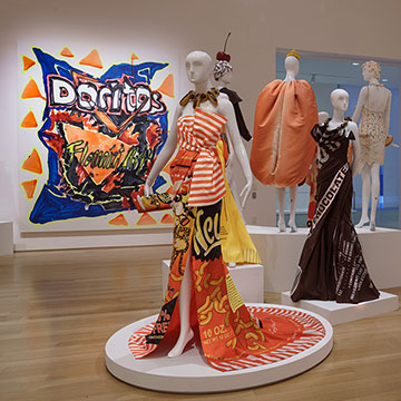 designs by Jeremy Scott displayed on mannequins at the Nerman Museum