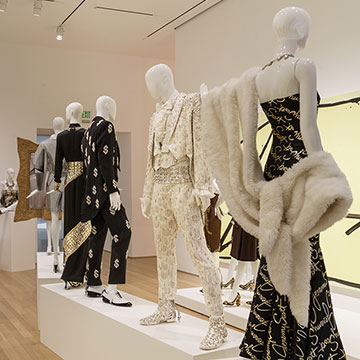 black and gold frocks designed by Jeremy Scott